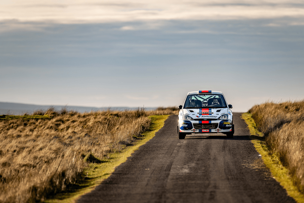 Focus WRC car driving towards camera